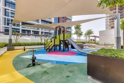 a playground in a building with a slide at GlobalStay Azizi Riviera 67 Apartments Dubai in Dubai