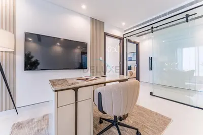 an office with a desk and a chair at Duplex Apartment Next to Zabeel Park, Steps from the Metro Station, and Minutes to Downtown Dubai, Al Kifaf 1 Residences East, Bur Dubai, by Deluxe Holiday Homes in Dubai