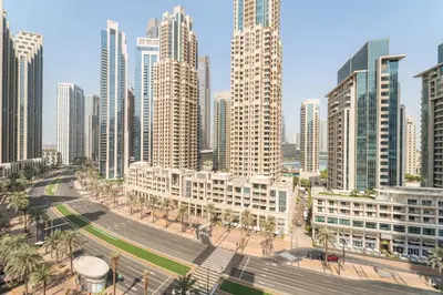 an aerial view of a city with tall buildings at Silkhaus Chic Studio in Downtown at Claren Tower in Dubai