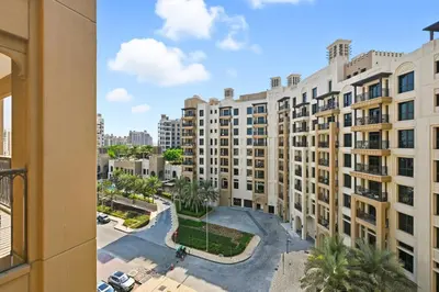 a view of a large apartment building from a balcony at Luxury 1BD Stay in Lamtara 2, Near Jumeirah Burj in Dubai