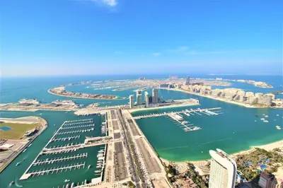an aerial view of the city of dubai at SkyRise Apartment with Stunning Sea View on 89 Floor in Dubai