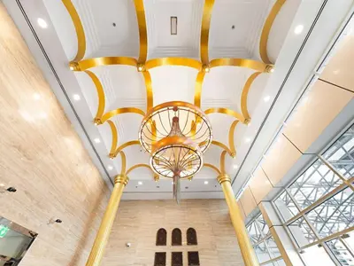 a large ceiling in a building with a chandelier at Opal Tower Condos - Dubai Marina in Dubai