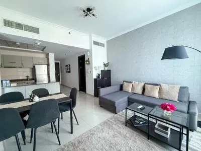 a living room with a couch and a table at Marina View-2BR,6 Guests, Central location, Marina Walk in Dubai
