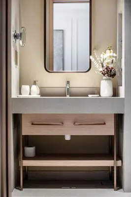 a bathroom with a sink and a mirror at Dubai Mall access Vida Stunning Design in Dubai