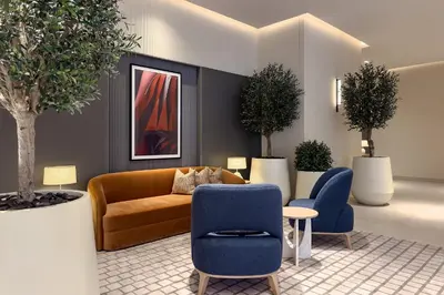 a living room with a couch and two chairs at Dubai Mall access Vida Stunning Design in Dubai