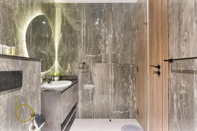 a bathroom with a sink and a toilet and a shower at Bookable Studio Room Joya Blanca,Arjan with Tennis court access in Dubai