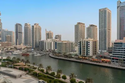 a view of a city with a river and buildings at FIRST CLASS 2BR Breathtaking Marina Views in Dubai