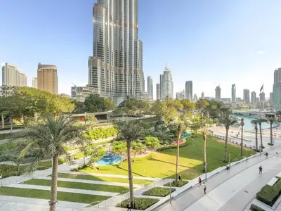 a view of a park with a city skyline in the background at VayK - Exceptional 3BR at Address Dubai Opera in Dubai
