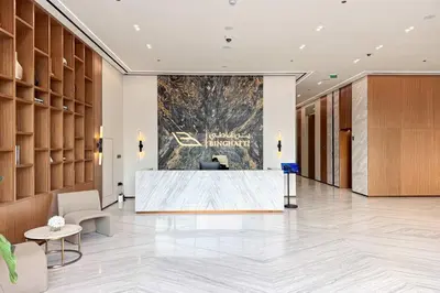 a lobby with a reception desk in a building at PVH - Cozy 1BR with City View - Binghatti House in Dubai