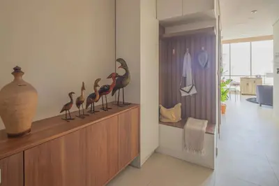 a group of birds on a shelf in a room at Frank Porter - Hilliana Tower in Dubai