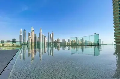 a view of a city skyline from a pool at Elegant 2 Bed Beach Front Retreat in Dubai