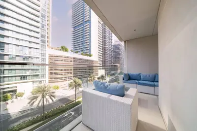 a living room with a view of a city at Elegant 2 Bed Beach Front Retreat in Dubai