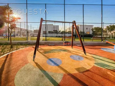 an empty playground with a swing set in a park at Senses at the Fields - Villa with a Private Pool in Dubai