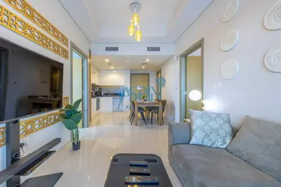 a living room with a couch and a table at Aspin 2BHK- Stay in the heart of Dubai- 45th floor in Dubai