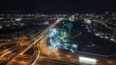 an aerial view of a city at night at Aspin 2BHK- Stay in the heart of Dubai- 45th floor in Dubai