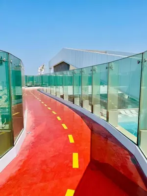 a red floor with yellow squares on the side of a building at Skyline 22 1 Residence in Dubai