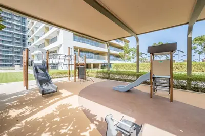 a view of a playground in a building at Balcony with Majestic Sea and Palm View with Assistant Room, Private Beach Access, Minutes from Marina and Palm Jumeirah Destinations, Emaar Beachfront by Deluxe Holiday Homes in Dubai