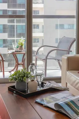 a table with a tray on top of a table at Frank Porter - No, 9 Dubai Marina in Dubai