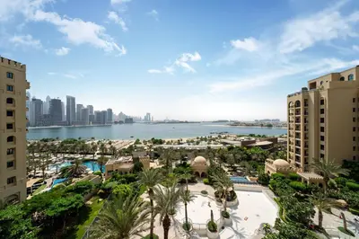 a view of the city of dubai from a resort at Fairmont Residence Modern 2bhk in Palm Jumeirah in Dubai