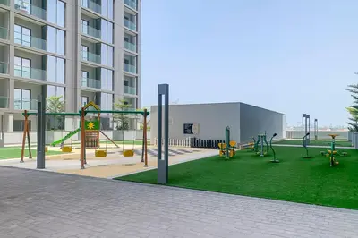 an empty playground in a building with a playground at Frank Porter - Sobha Hartland The Crest Tower C in Dubai