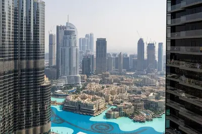 an aerial view of a city with tall buildings at Luxury 2BR at Address Opera with Burj Khalifa view in Dubai