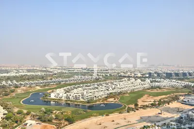 an aerial view of the city of skaga at Staycae Holiday Homes Golf Gate - Damac Hills in Dubai