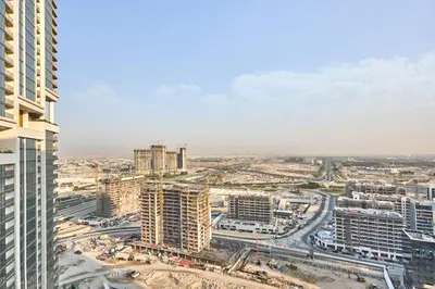 an aerial view of a city with tall buildings at STAY BY LATINEM Luxury 1BR Holiday Home CB 2601 Near Burj Khalifa in Dubai
