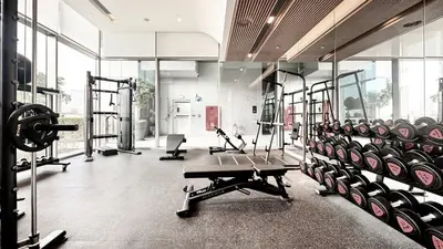 a gym with a lot of equipment in a room at Vida Residence Dubai Mall by Propigo in Dubai