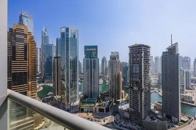 a view of a city with tall buildings at Skyview Luxe 4BR - Elegant Sea & Ain Dubai View in Dubai