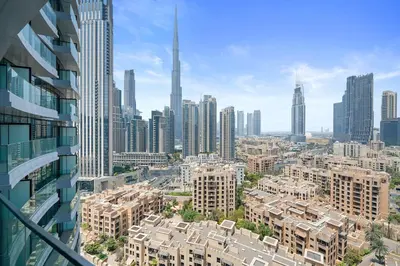 an aerial view of a city with tall buildings at Classy and Chic 2BR in Downtown with Burj Khalifa View in Dubai