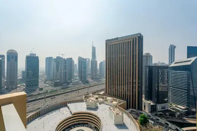 a view of a city with a highway and buildings at Marina Views & 5-Star Comfort Dubai Marina in Dubai