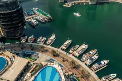 an aerial view of a marina with boats in the water at Marina Views & 5-Star Comfort Dubai Marina in Dubai
