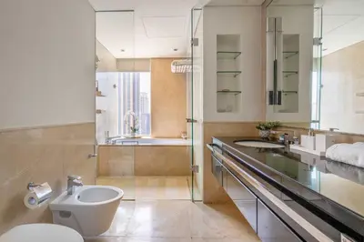 a bathroom with a toilet and a sink at Marina Views & 5-Star Comfort Dubai Marina in Dubai