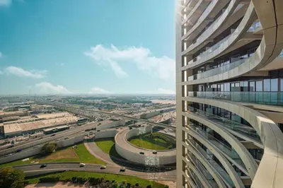 a view from the side of a tall building at Cozy 2BR Aykon City Near Downtown - Pool and Gym in Dubai