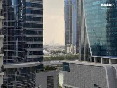 a view of a city with many tall buildings at Luxury Stay at Zada Tower 1BHK in Business Bay in Dubai