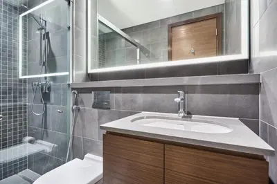 a bathroom with a sink and a shower at STAY BY LATINEM Luxury 1BR Holiday Home CB 3813 Near Burj Khalifa in Dubai