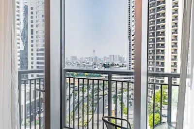 a balcony with a view of a city at Partial Creek Harbour Views, Close to the Creek Harbour Marine Station and Harbour Promenade, Just Minutes from a Park, Harbour Views Tower 2, Dubai Creek Harbour by Deluxe Holiday Homes in Dubai