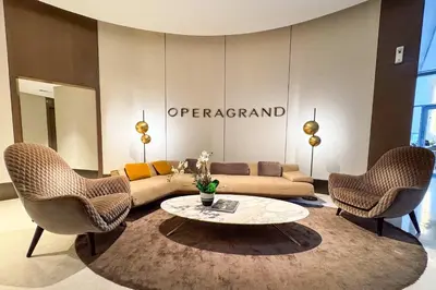 a living room with a couch and two chairs and a table at PVH - Elegant 2BR near Dubai Mall - Opera Grand in Dubai
