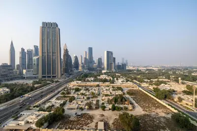 an aerial view of a city with skyscrapers at Luxury 2BR Walk-In Closet Full Burj Khalifa View in Dubai