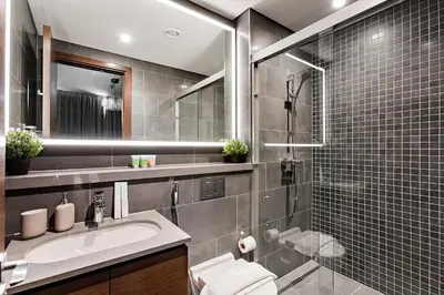 a bathroom with a sink and a shower at Inspiring 1BR Apartment at Sobha Hartland in Dubai