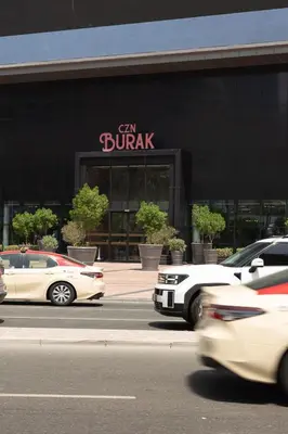 a car parked in front of a building at Stunning One bed Dubai mall downtown in Dubai