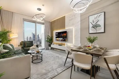 a living room with a table and a dining room at Vida Dubai Mall! 2 Bedroom with Burj Khalifa View! Direct Access to Dubai Mall in Dubai