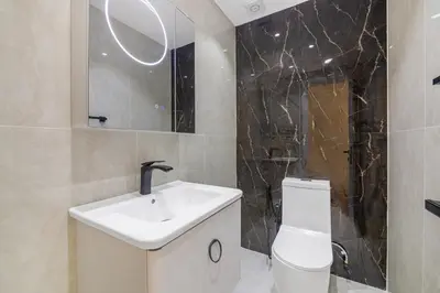 a bathroom with a sink and a toilet at Lux 3 Bedroom apartment in Marina DEC 1103 in Dubai