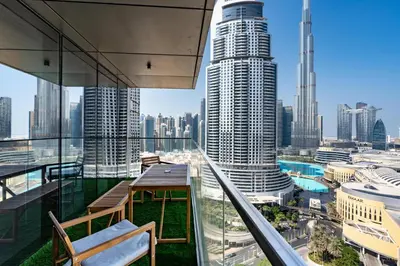 a view of a city from the balcony of a skyscraper at Boulevard Point I Burj Khalifa Fireworks View in Dubai