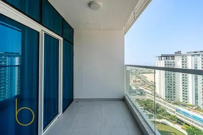 an empty room with a large window in a building at Bookable 1 Bed in Opalz by Danube in Dubai