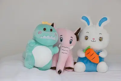 a group of stuffed animals sitting next to each other at Stylish Family Retreat That Sleeps 6 In The Heart of JVC in Dubai