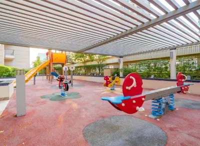 a playground with children playing on a slide in a building at Fountain & Opera Views 1 Bedroom Apartment with Balcony in Dubai