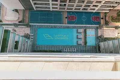 a building with a sign that reads intelligent embassy at Deluxe Binghatti Suites by Hostiva - Burj View in Dubai