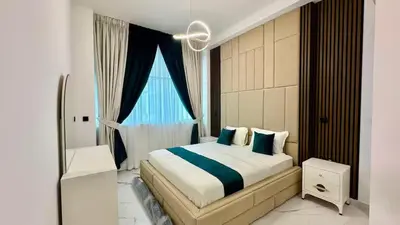 a bedroom with a large bed and a window at Limited Time l Private Pool I Elegance l Prime Location in Dubai