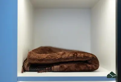 a pair of brown boots sitting on a shelf at Peaceful Studio in Opalz by Danube by BMS in Dubai